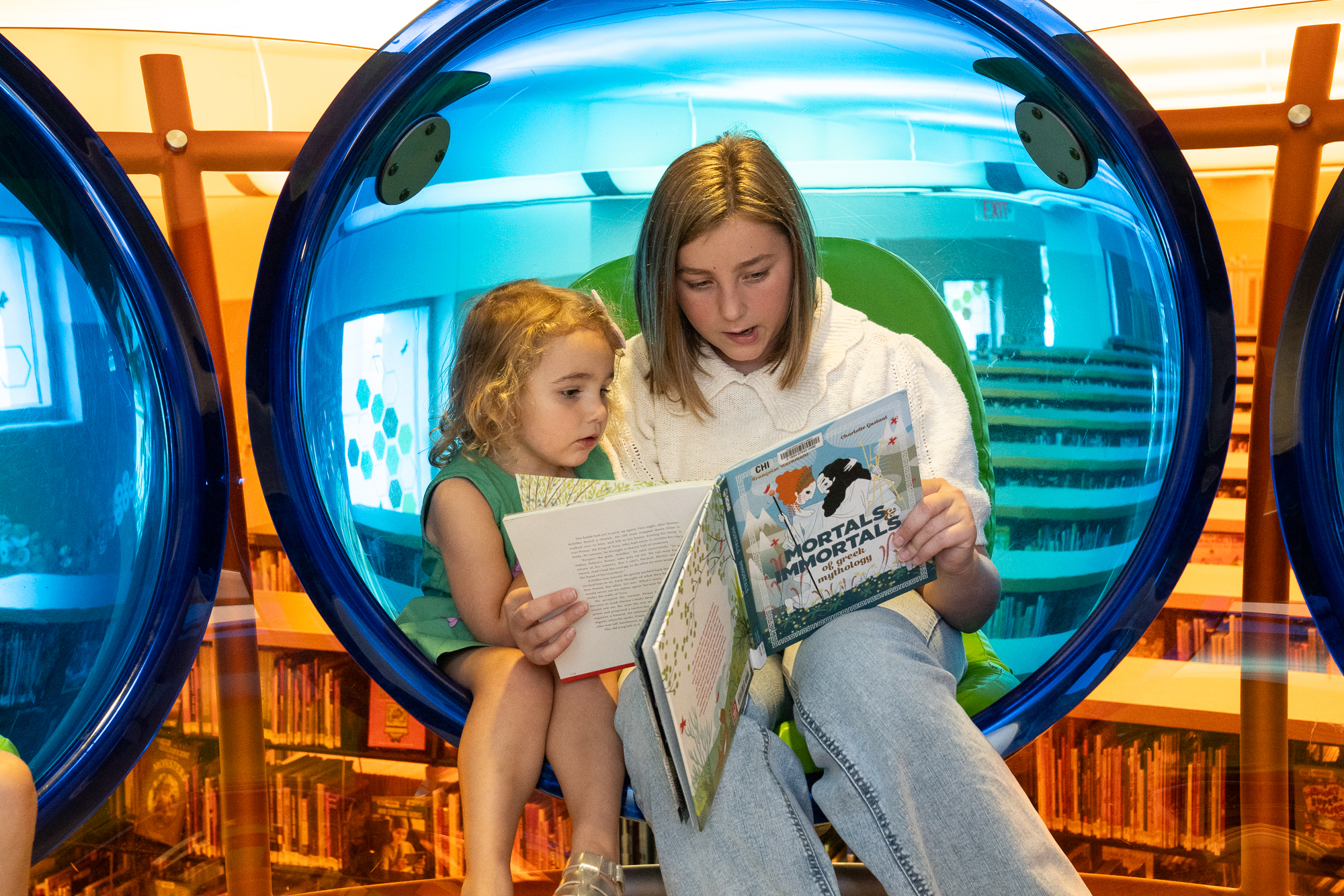Children Reading together at the downtown library branch