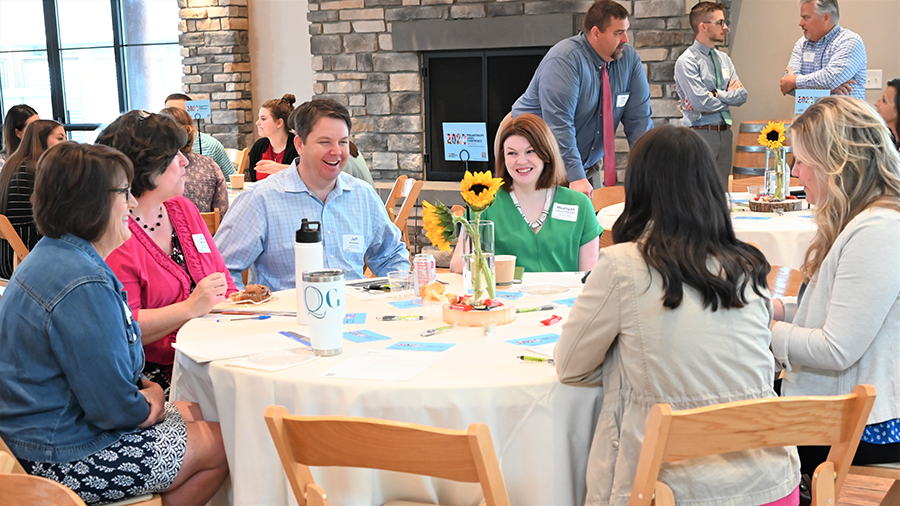 Attendees of the 2022 IPA Rural Prosperity Symposium have a robust discussion.