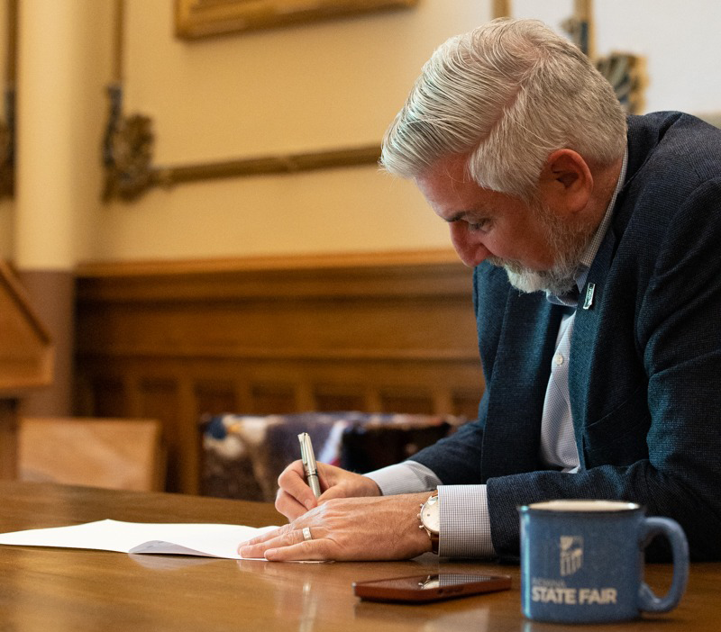 Gov. Eric Holcomb signs off on increased funding for public health and mental health.